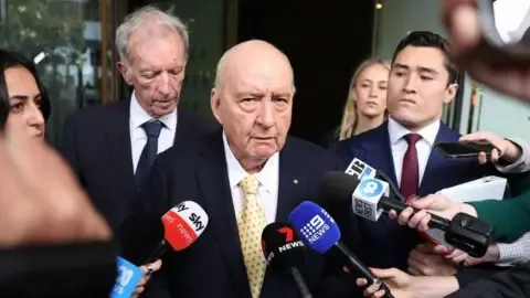 Indecent Assault Charges Against Prominent Australian Broadcaster Lessened